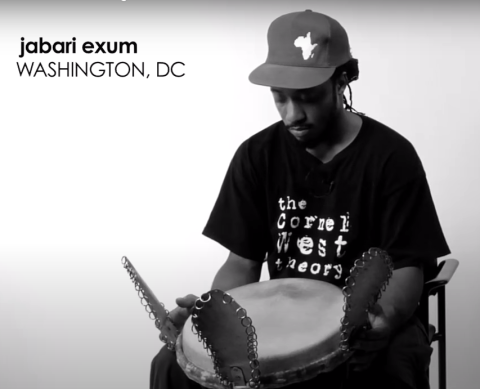 Jabari prepares to play Djembe