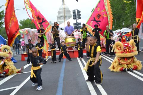 Fiesta Asia 2013, Children perform forms as lions await.